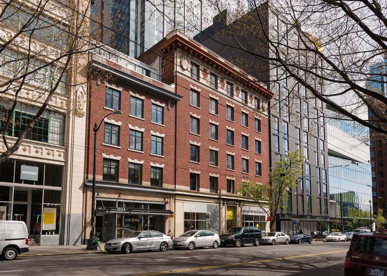 The Oxford, a brick mixed-use building in downtown Seattle